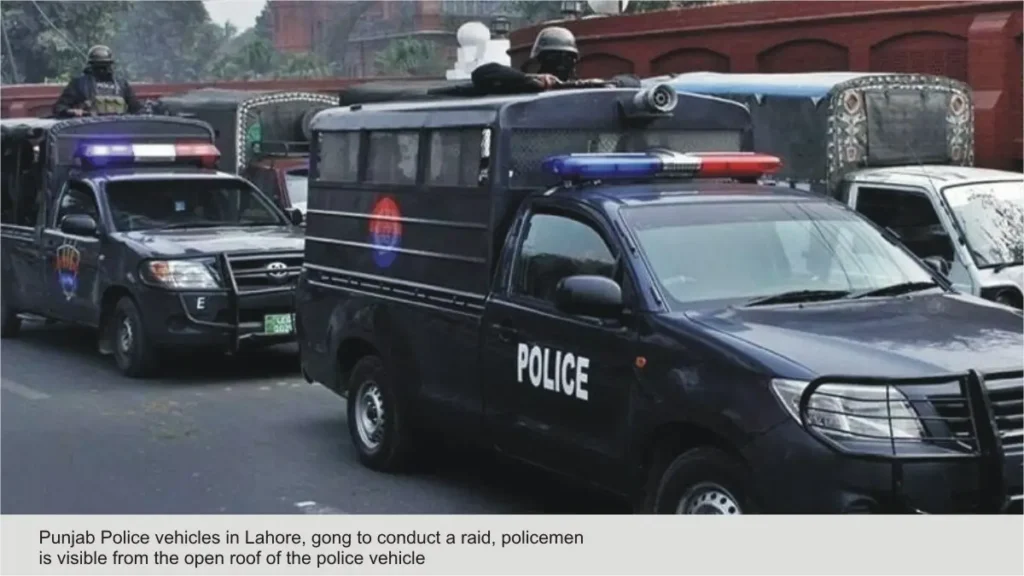 Punjab Police vehicles in Lahore, gong to conduct a raid, policemen is visible from the open roof of the police vehicle