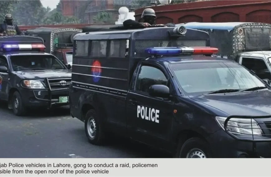 Punjab Police vehicles in Lahore, gong to conduct a raid, policemen is visible from the open roof of the police vehicle