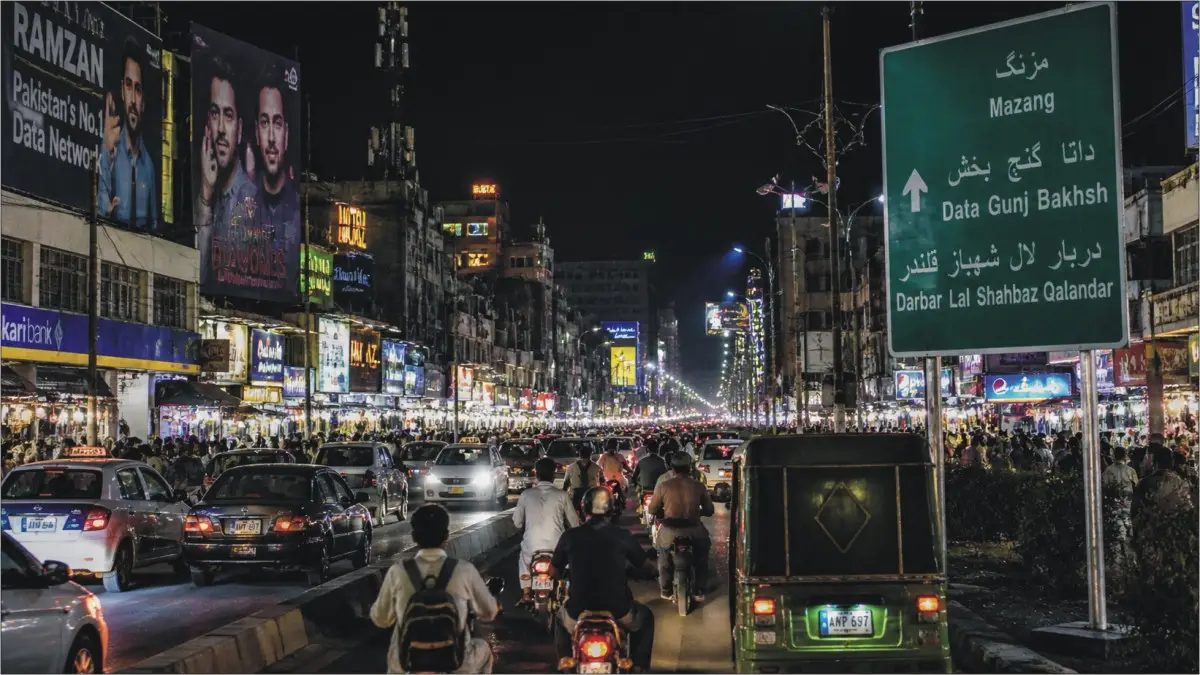 A brightly lit street in Pakistan representing the end of electricity load-shedding